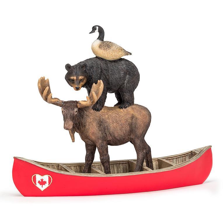 STACKED WINTER ANIMALS IN A CANOE FIGURINE
